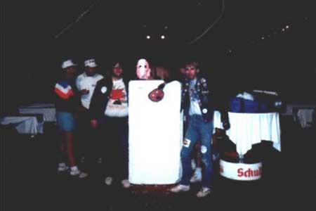 Stage brick: That's Tom on the right, and on the left a guy he met there, Bruce. They are pictured with one of the actual bricks used in building The Wall that night. Somebody managed to grab one and bring it backstage after, and they were among many fans posing for pics of it. The guys who grabbed it said they were gonna try and get it back to the states with them, but Tom doesn't know if they ever managed it.