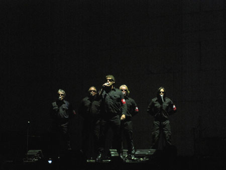 The Male Chorus with Robbie Wyckoff onstage in Chicago, IL (photo by Robert Perry)