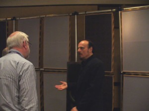 James Guthrie discusses the demonstration with members of the press.