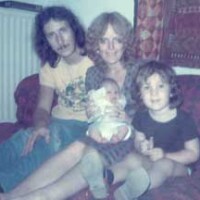 John in 1974 with wife Rae & children Luke & Becky. Notice the T-shirt!